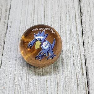 Vintage Pokemon #55 Golduck Marble Clear Orange Glass Toy Biz Collectible